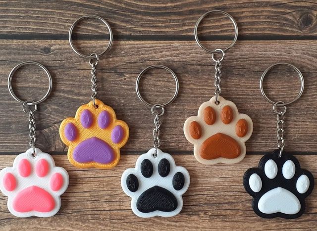 Llaveros huellas de perritos en 3D