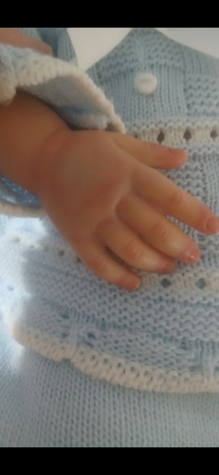 Bebé reborn cn portábebes manta ropa y Nancy