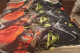 Coperta pile fiori arancioni