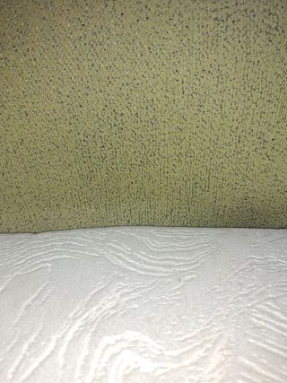 Sofá cama beige y verde
