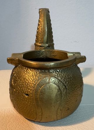 Cenicero nautico de bronce.