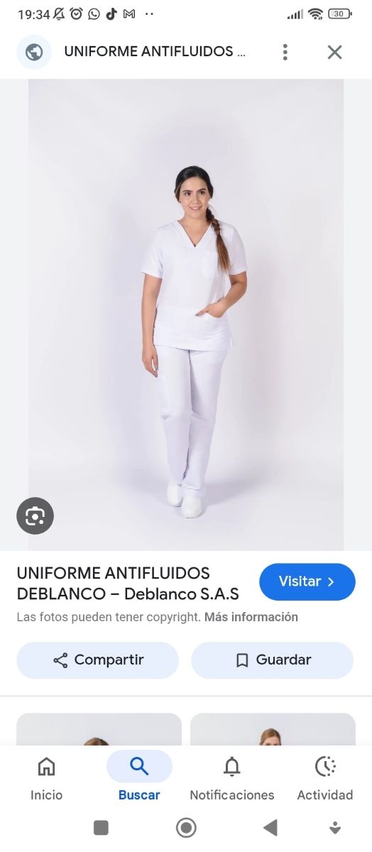 Uniforme blanco de mujer sin estrenar