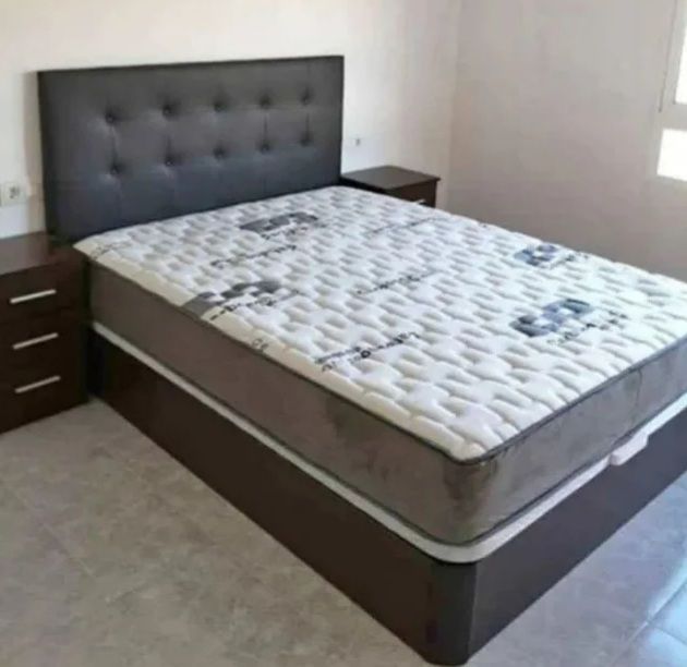 Canapé abatible con cabecero