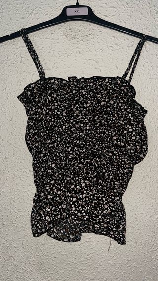 Top negro estampado flores -xs
