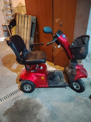 Moto eléctrica roja para mayores