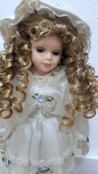 Muñeca porcelana comunión o novia precio 35e.
