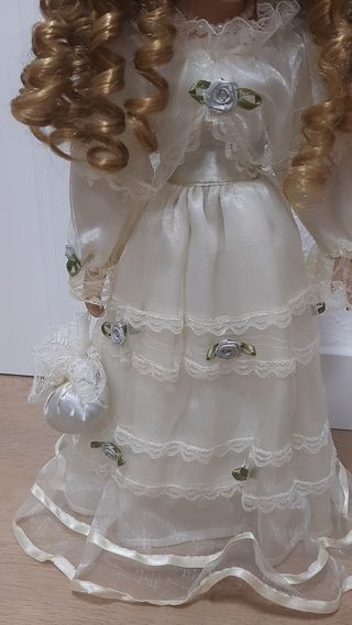 Muñeca porcelana comunión o novia precio 35e.