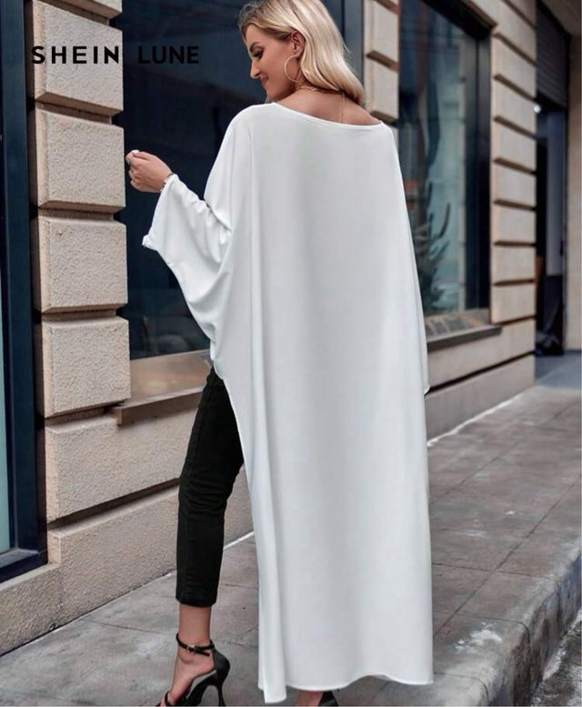 Blusa blanca asimétrica