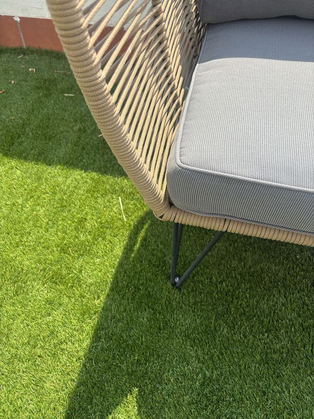 Sillón exterior de cuerda y metal.con almohadas