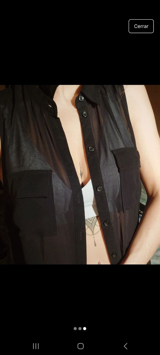 Blusa negra transparente sin mangas