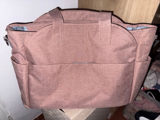 Bolso rosa carro
practicamente nuevo 
1 mes de uso