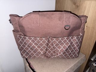 Bolso rosa carro
practicamente nuevo 
1 mes de uso