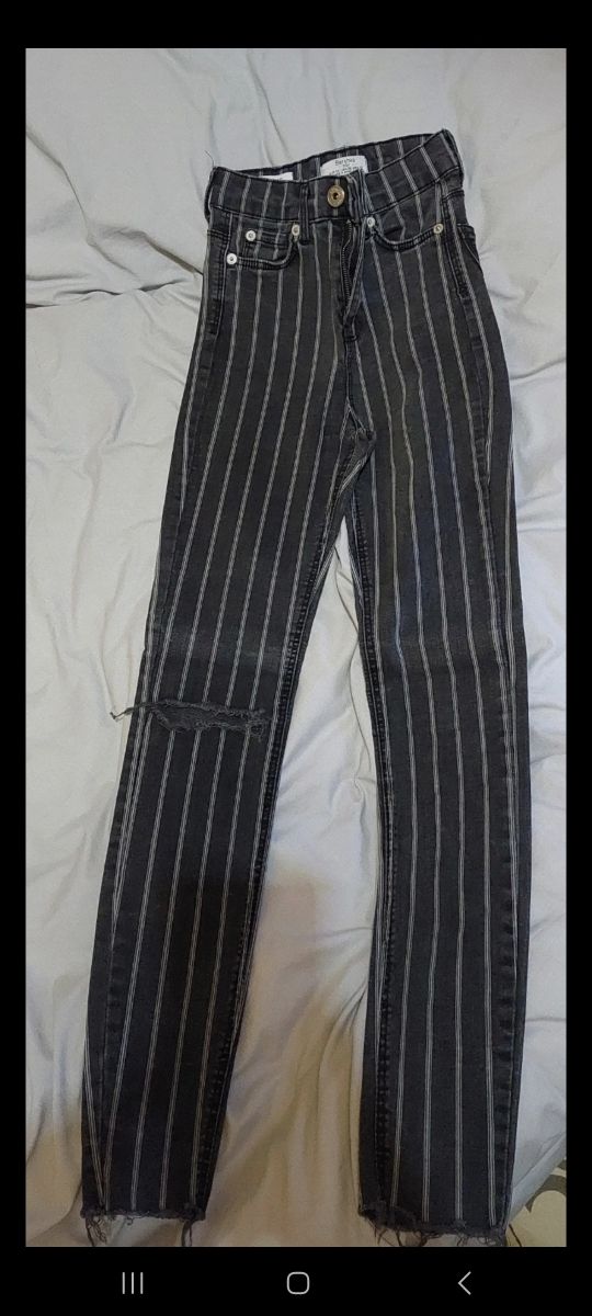 Pantalones rayados negros