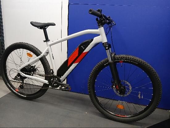 Bicicleta eléctrica MTB Rockrider E-ST 100 Blanco Rojo