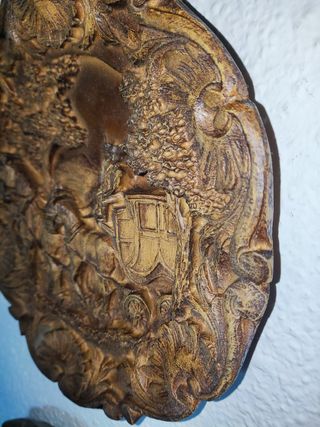 3 piatti in legno intagliato