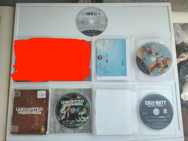 PS3 Slim Negra + 4 Juegos