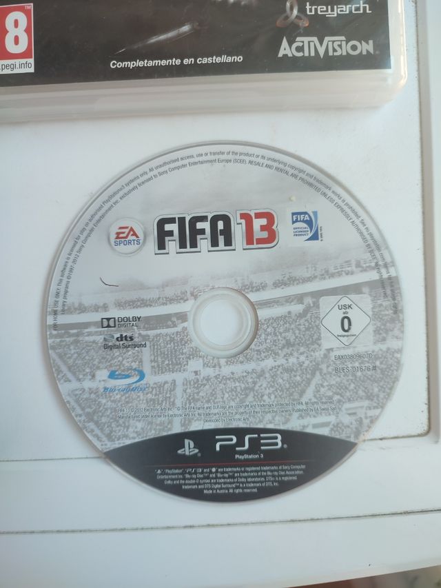 PS3 Slim Negra + 4 Juegos