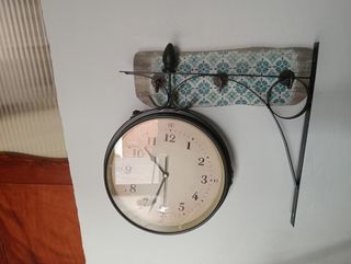 Reloj de pared vintage por ambas caras.