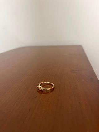 Anillo dorado acero