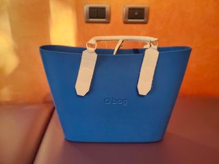 O bag celeste con manici