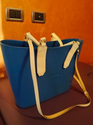 O bag celeste con manici