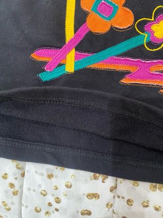 Falda NEVER MIND negra estampada