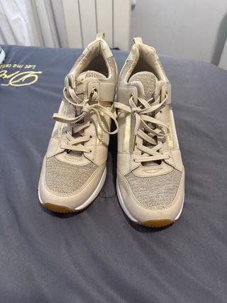 Zapatillas Michael Kors doradas