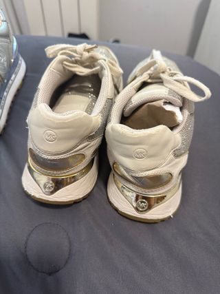 Zapatillas Michael Kors doradas