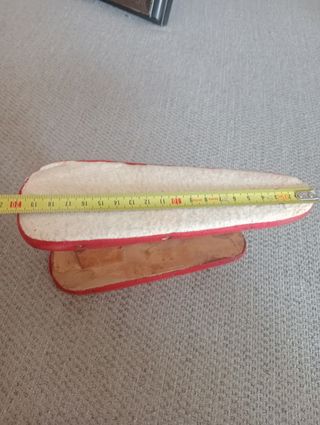 Antigua pieza de juguete para planchar, madera