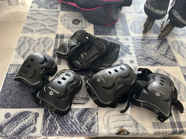 Patines, bolsa y material proteccion