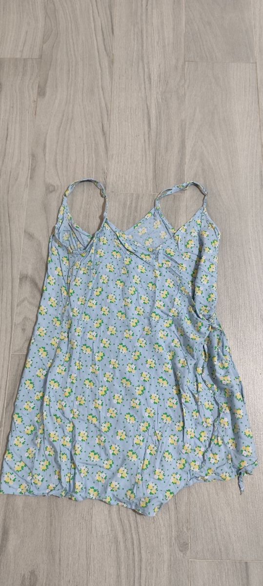 Peto Lefties azul claro con flores