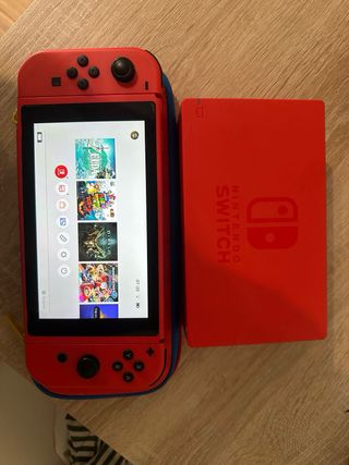 Nintendo Switch roja + funda + 9 juego