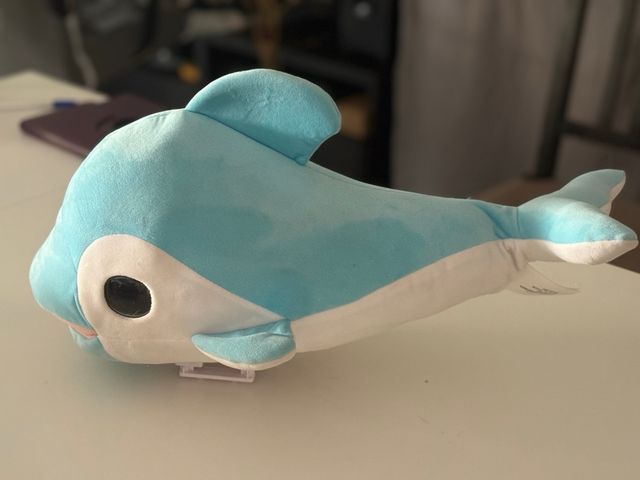Delfín peluche interactivo