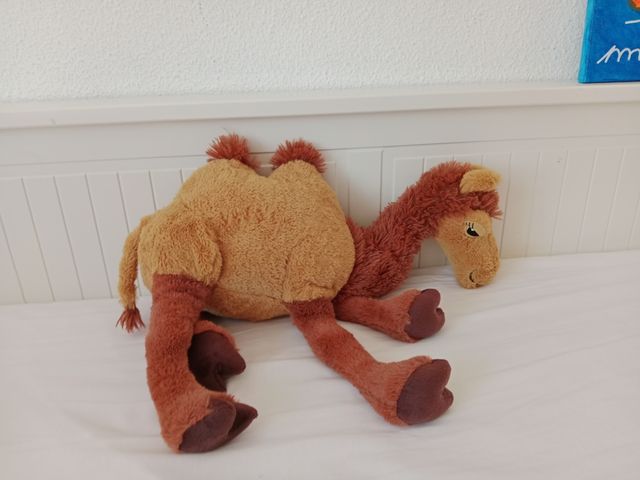 Peluches infantiles: León, panda, gato, camello y