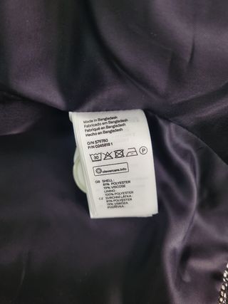 Cazadora H&M cruzada entallada doble botonadura.