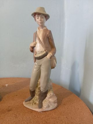 Figura porcelana cazador años 70