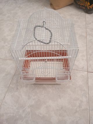 Jaula pájaros marrón y blanca