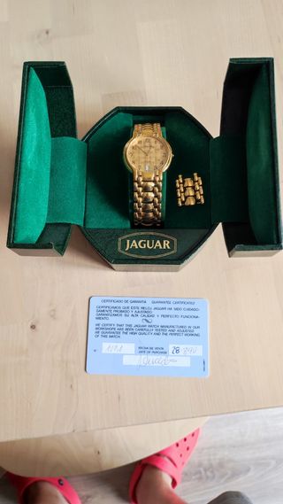 Reloj Jaguar dorado - Años 90