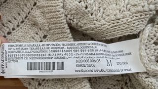 Top Stradivarius beige hombro