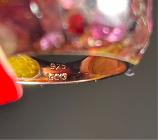 Anillo piedra granate facetada y oro rosa