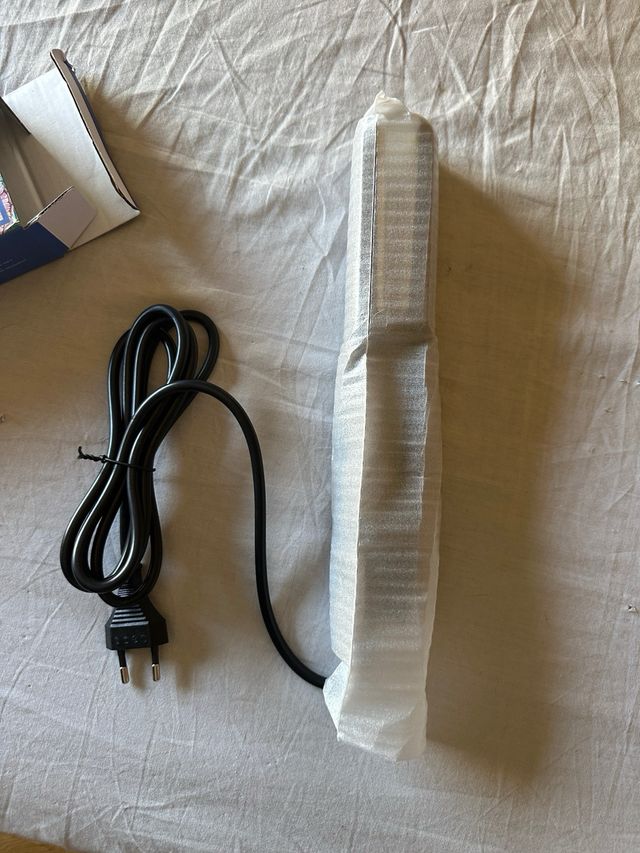 Plancha de pelo onduladora nueva con etiquetas