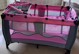 Cuna viaje bebé rosa