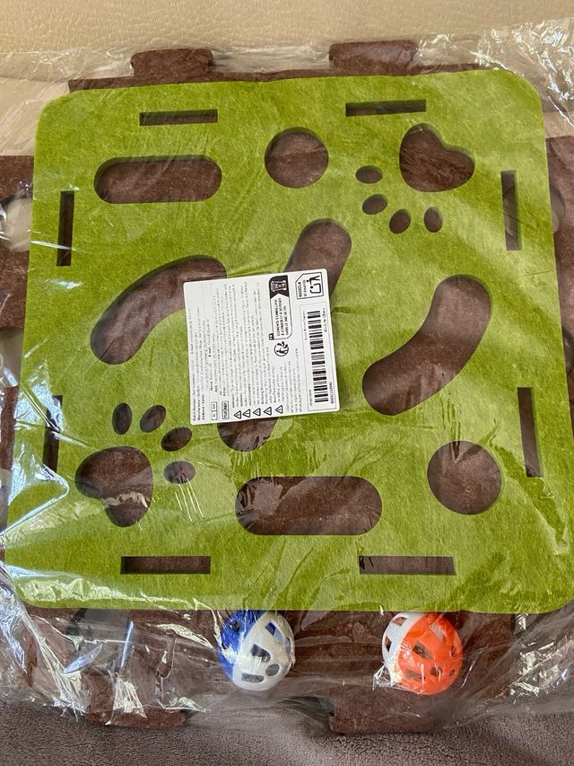 Juguete gato - Alfombra interactiva.