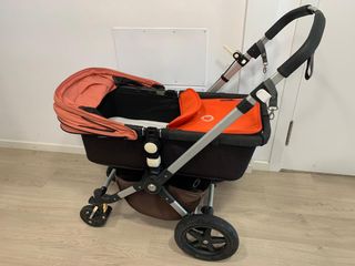 Bugaboo Cameleon rojo con accesorios.
