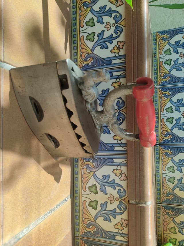 Plancha antigua de hierro