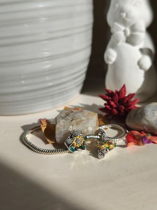 Charm de plata girasoles