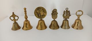 7 campane in bronzo e ottone.