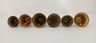 7 campane in bronzo e ottone.