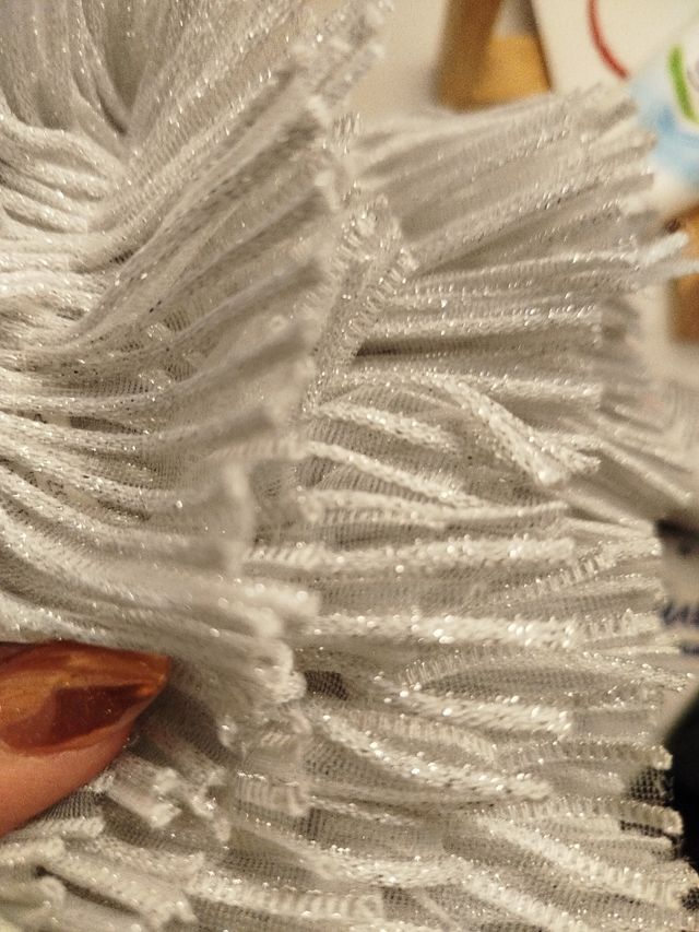 Top plateado con volantes