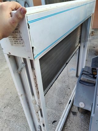 Ventana corredera con persiana
